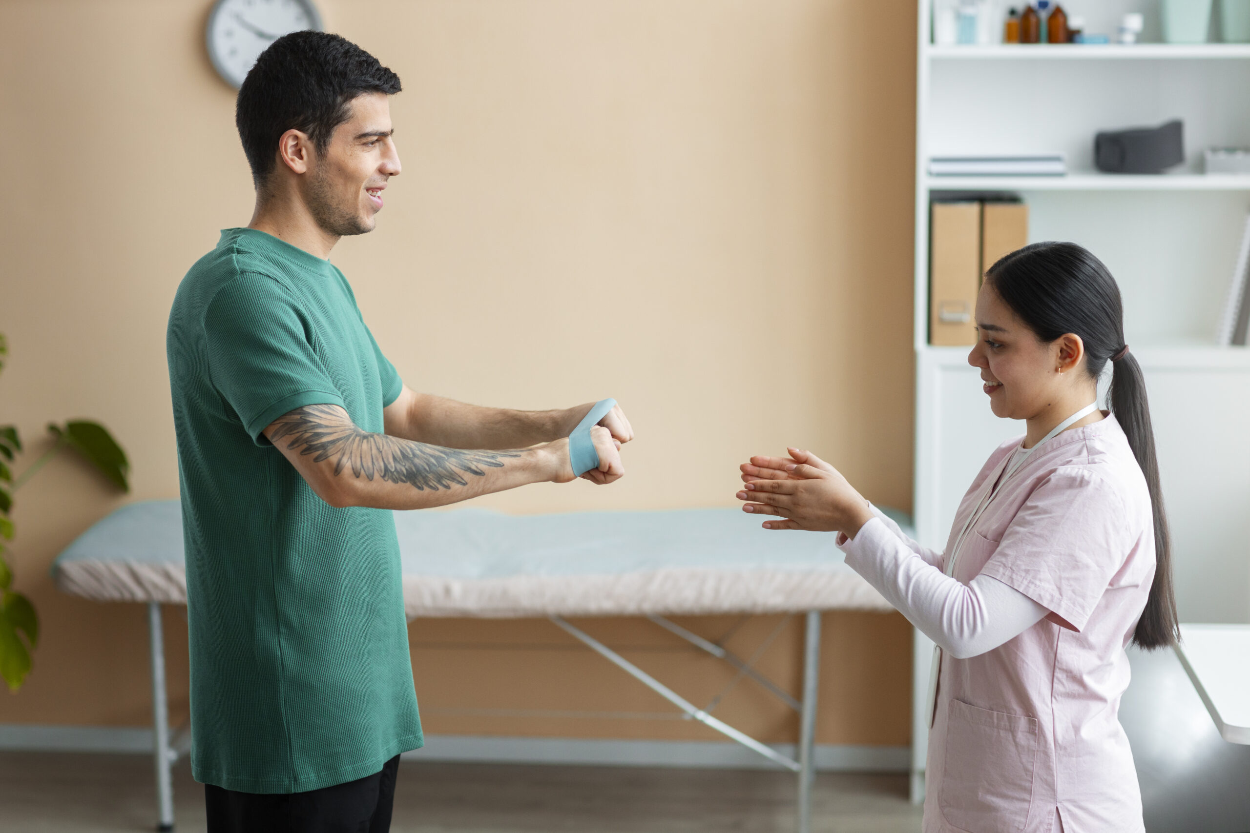 Physiotherapist helping patient recover from car accident injuries with hands-on therapy in Ottawa