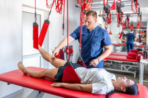 Physiotherapist assessing a patient's neck during MVA physiotherapy at Care2Cure Physiotherapy in Ottawa